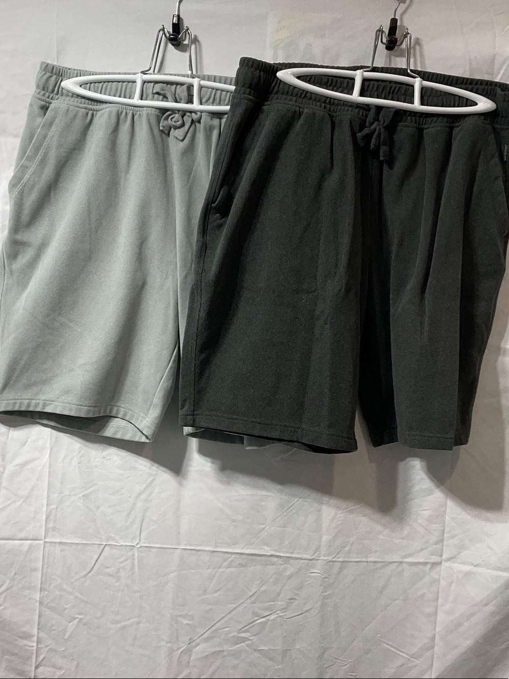 Two Pairs of Men’s Shorts.  One is Light Grey & One is Dark Grey.